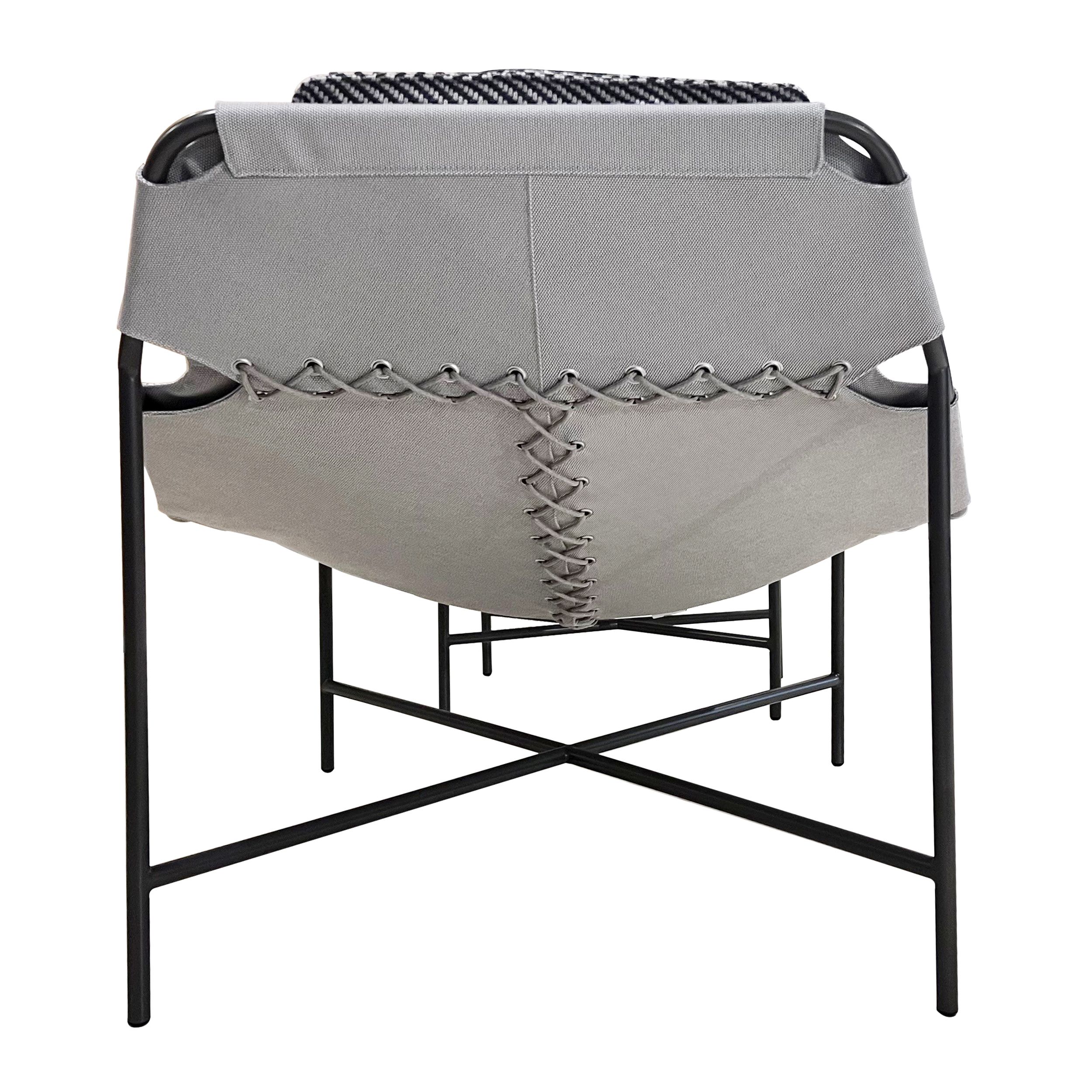 Gartensessel 228 inklusive Hocker von Rolf Benz als Rückansicht in grau mit Kissen